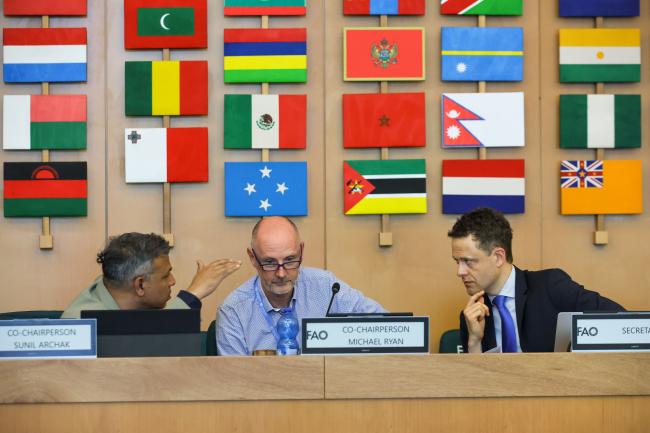 Working Group Co-Chairs: Sunil Archak, and Michael Ryan consulting with Tobias Kiene, ITPGRFA Secretariat
