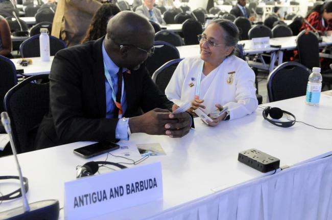 Daryll Matthew, Minister of Education, Sports and The Creative Industries, Antigua and Barbuda, and Payal Dwivedi, Brahma Kumaris Raja Yoga Center