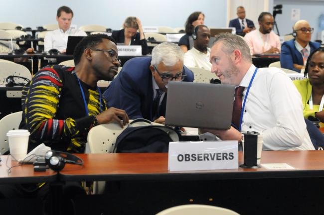 Participants confer during the event