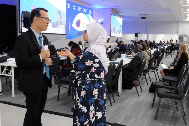 Paisan Rupanichkij, Thailand, and Hajah Noor Qamar Binti Haji Sulaiman, Brunei