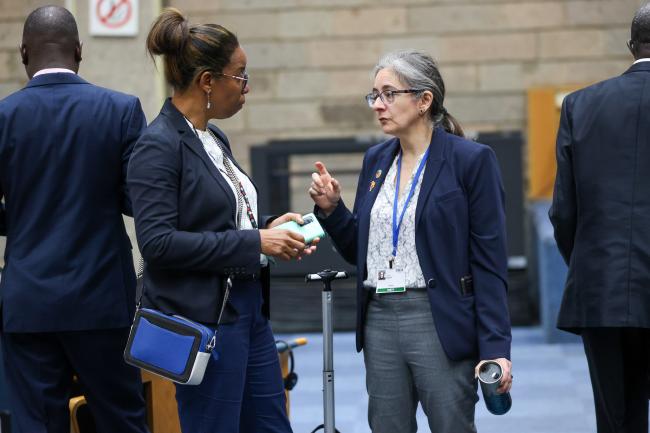 Gillian Guthrie, Jamaica, with Carolina Caceres, Canada