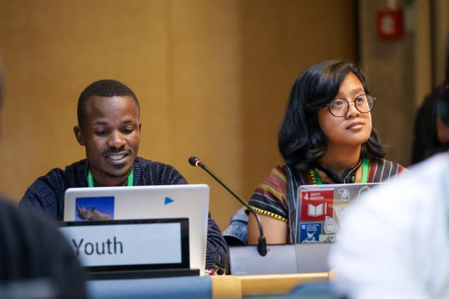 Youth delegates delivering their statement