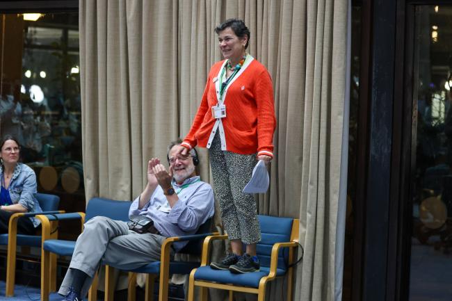 Delegates and participants congratulating Véronique Allain, CBD Secretariat for more than 20 years of contribution to the work of the CBD
