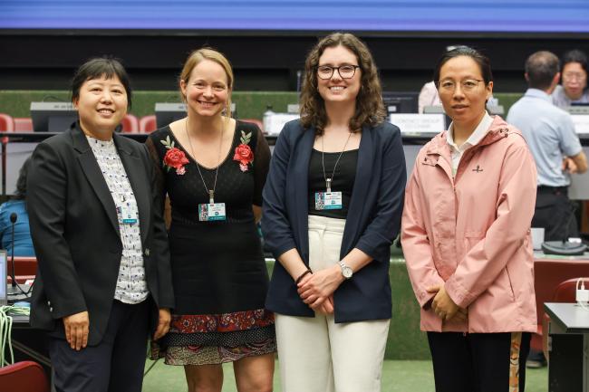 Delegates from China and Canada