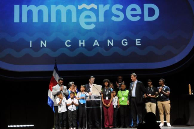 Costa Rican children present their Letter to the Ocean to Rodrigo Chaves Robles, President of Costa Rica
