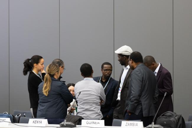 Delegates speak informally