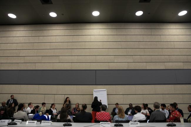 Delegates break out into groups to share experiences and views