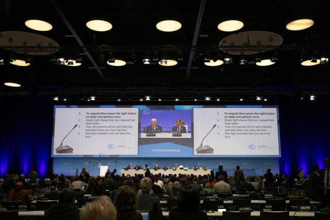After a 5-hour delay, delegates gather for the closing plenary