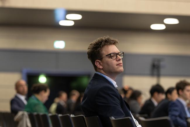 Delegates listen to the different presentations