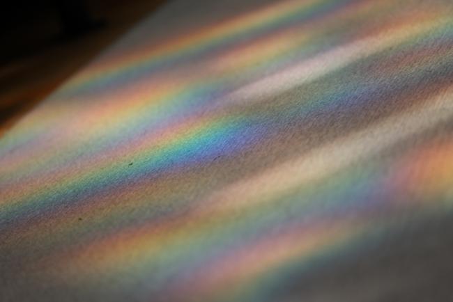 Rainbows fall across the floor in Chamber Hall