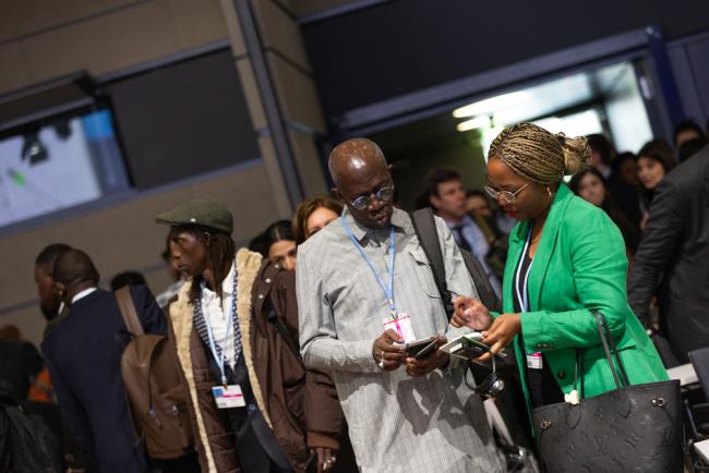 Delegates speak informally