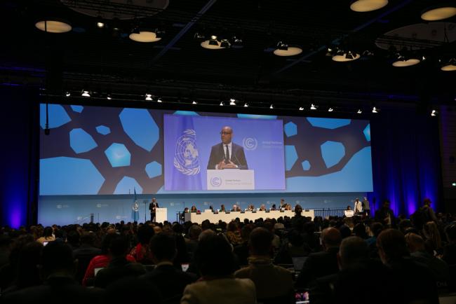 Delegates gather during the opening plenary