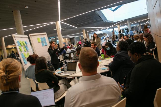 Participants work in breakout groups to discuss a number of topics
