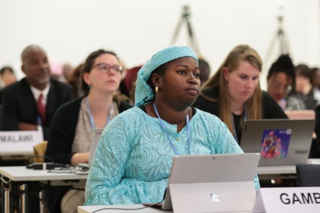 Delegates listen to the discussions