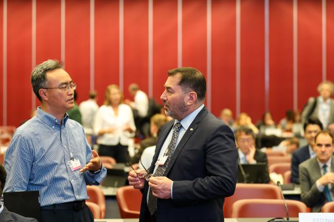 Liu Jianguo, China, with Osvaldo Patricio Álvarez Pérez, Chile