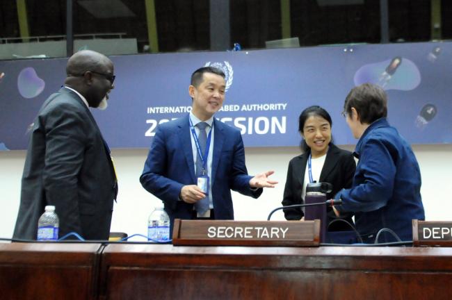 Amara Sowa, Sierra Leone; Haibo Gou and Wenting Zhao, China; with Gwénaëlle Le Gurun, ISA Secretariat