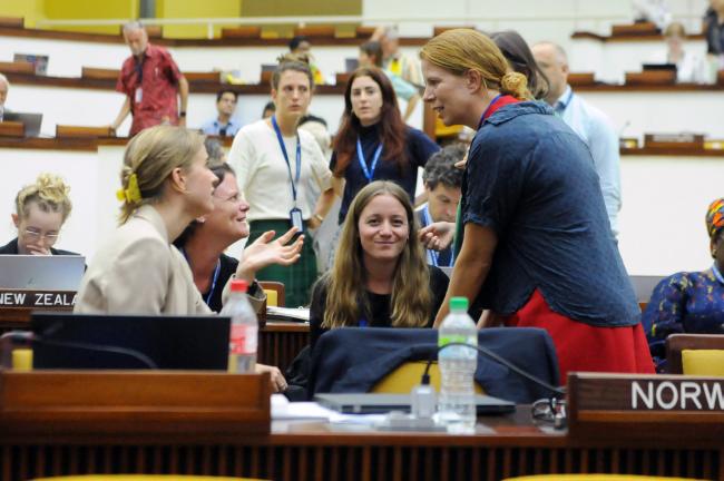 Delegates from Norway and Denmark discuss informally