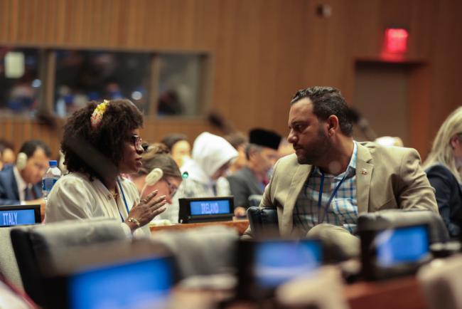 Delegates from Dominica consult