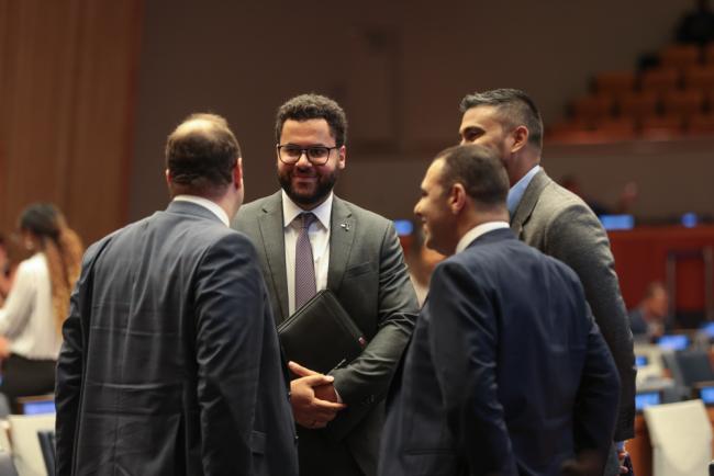 Delegates speak informally