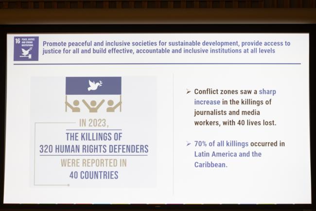 A slide highlights the increasing danger for environmental defenders and journalists