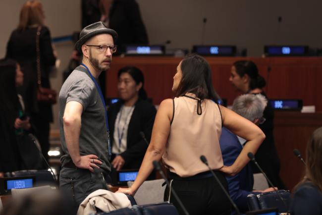 Delegates speak informally
