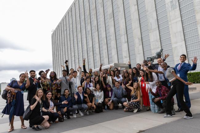 As the first week of HLPF 2024 concludes with a discussion on civil society, representatives of the Major Group for Children and Youth (MGCY) gather for a family photo outside UN Headquarters