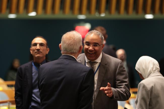 Delegates speak informally