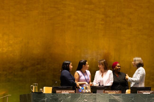Member of the UN speak informally on the podium of the UN General Assembly