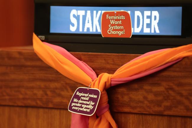 Colorful scarves decorate the venue as the Women's Major Group demands 'gender equality everywhere'