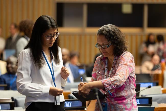 Delegates prepare for the day