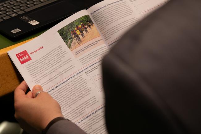 Delegates read the latest statistics on SDG 1 from the Sustainable Development Goals Report for 2024