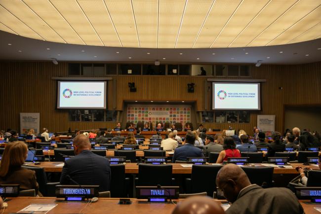 Delegates gather to hear an update on SDG 1