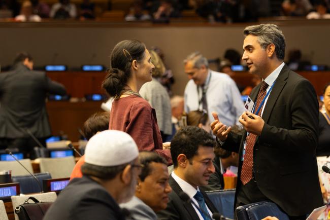 Delegates speak informally
