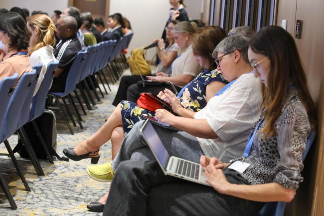 Delegates take notes 