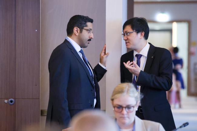 Ali Alshalawi, Saudi Arabia, and Liang Pei, China