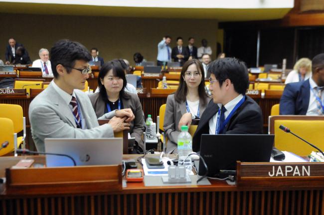 Delegates from Japan confer
