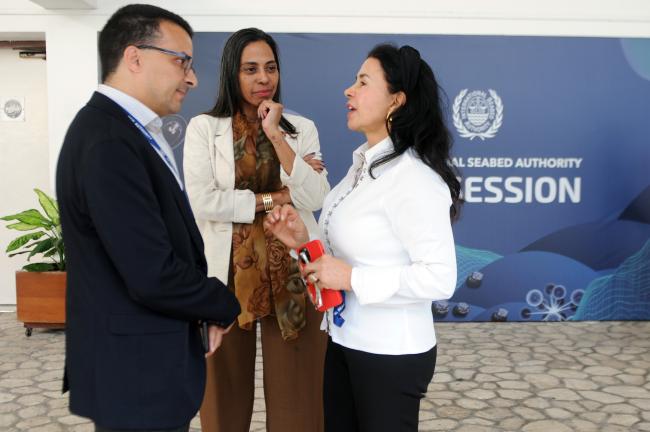Salim Lahsini, Morocco, with Leticia Carvalho and Elza Moreira Marcelino de Castro, Brazil