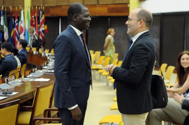 Tidiani Couma, Monaco, and Jose Dallo, ISA Secretariat