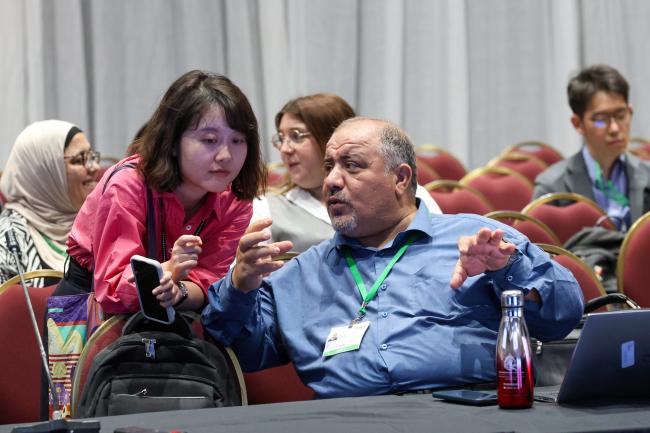 Ye Wang, China, and Bilal Qtishat, Jordan