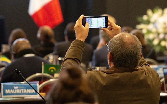 Participant taking a picture of the screen - IWC69-26sep2024