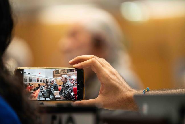 Delegate filming an intervention by the Farmers' Organization