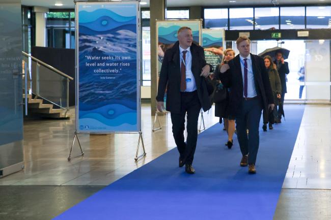 Delegates arrive for the second day of Water Convention MOP 10 