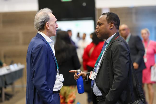 Santiago Carrizosa, UN Development Programme, and Olivier Rukundo, CBD Secretariat