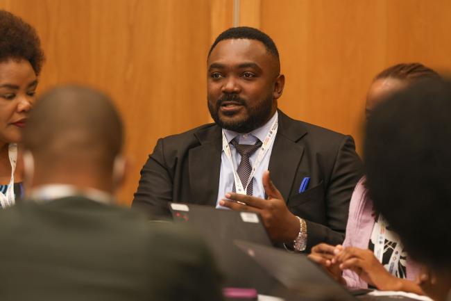 Delegates exchange views throughout the day
