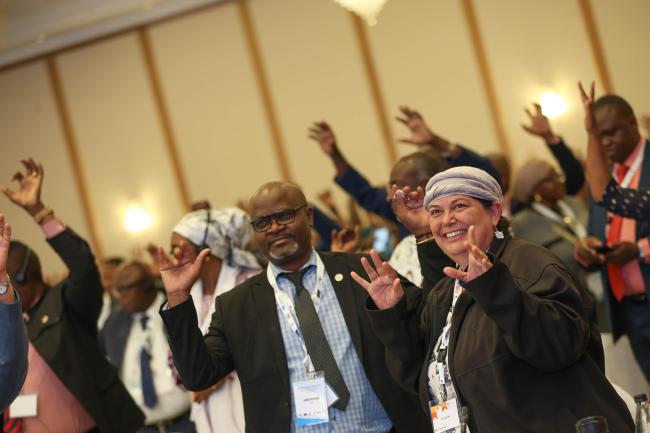 Delegates participate in an interactive game