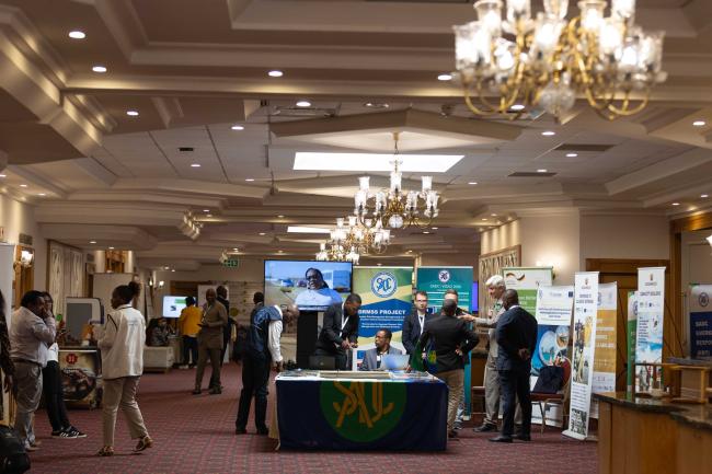 Delegates meet informally around the venue