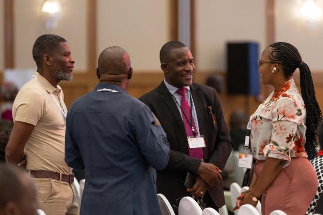 Delegates speak informally