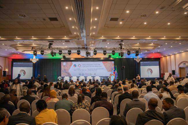 Delegates gather in plenary for the opening ceremony of AfRP-9