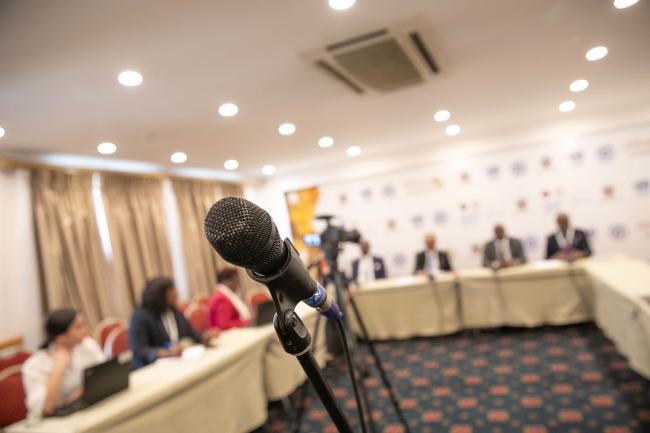 A press conference is held to emphasize the importance of the meeting