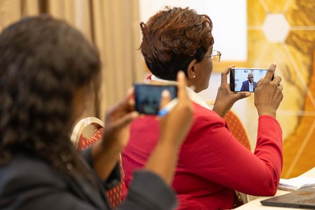 Local journalists document the proceedings